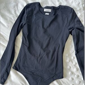 Babaton black bodysuit in size M